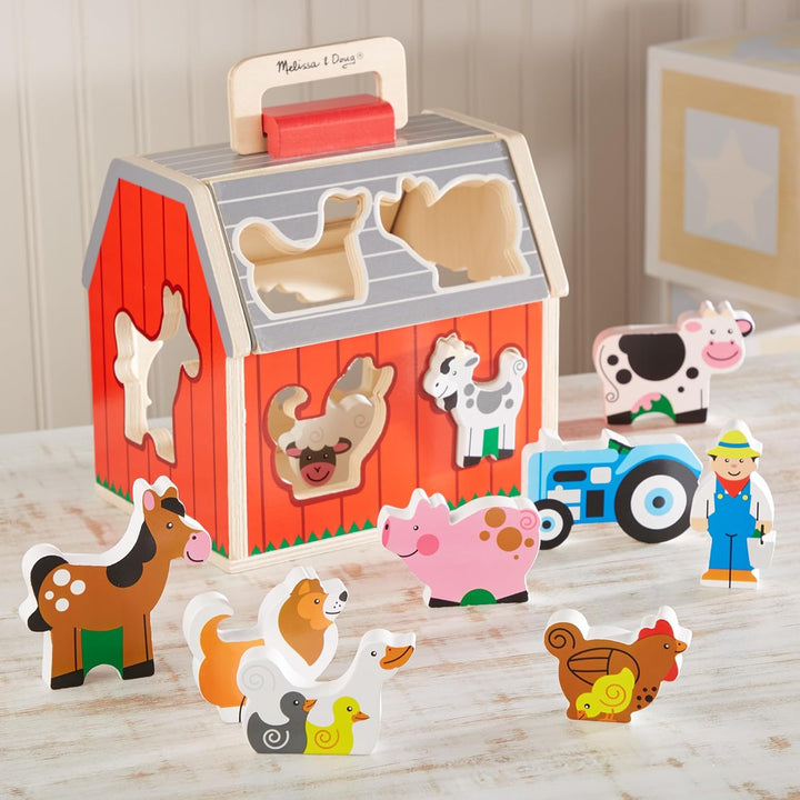 Wooden Take-Along Sorting Barn Toy with Flip-Up Roof and Handle, 10 Wooden Farm Play Pieces - Farm Toys, Shape Sorting and Stacking Learning Toys for Toddlers and Kids Ages 2+