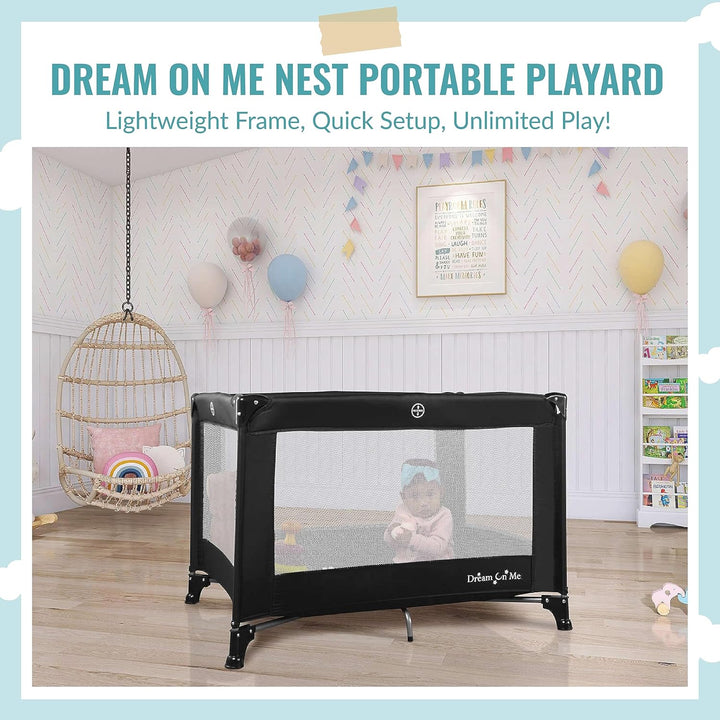 Nest Portable Playard in Black with Carrybag an Shoulder Strap, Lightweight, Packable and Easy Setup Baby Playard, Breathable Mesh Sides and Soft Fabric - Comes with a Removable Padded Mat