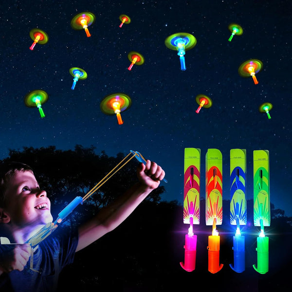 25 Packs LED Flying Toys Set with Whistle,25 Rocket Slingshot+25 Glow Arrow Helicopter for Summer Outdoor Camping Toys Game LED Slingshot Toy for Kids Glow in the Dark Party Supplies 8-12,4-8