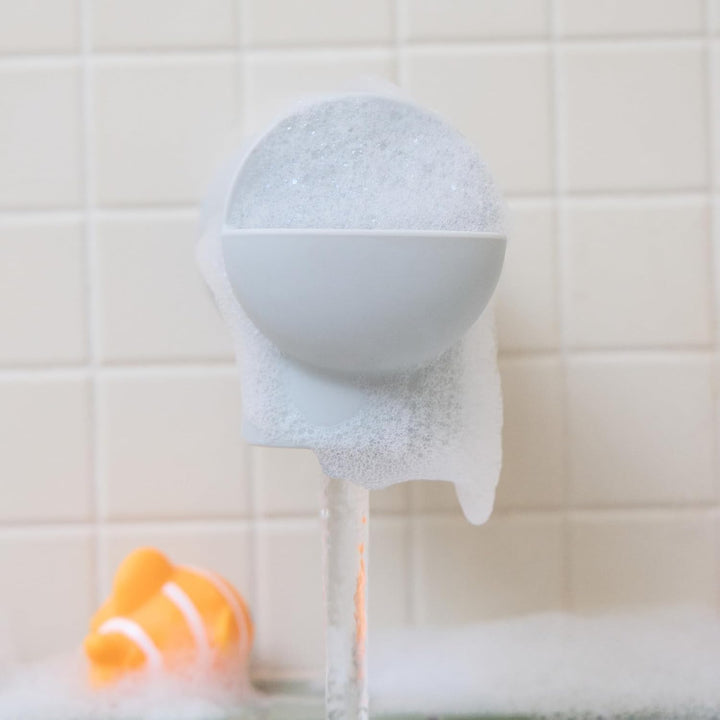 ® Soft Spot™ Bath Spout Cover for Baby, Bathtub Guard with Built-In Bubble Bath Dispenser, Silicone, Grey