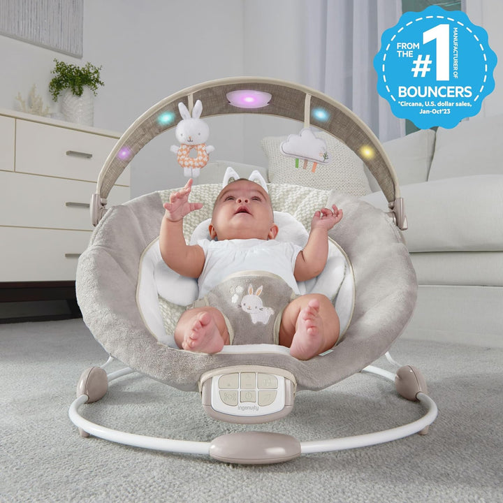 Inlighten Baby Bouncer Infant Seat with Light up -Toy Bar, Vibrations, Tummy Time Pillow & Sounds, 0-6 Months up to 20 Lbs (Twinkle Tails Bunny)