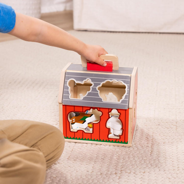 Wooden Take-Along Sorting Barn Toy with Flip-Up Roof and Handle, 10 Wooden Farm Play Pieces - Farm Toys, Shape Sorting and Stacking Learning Toys for Toddlers and Kids Ages 2+
