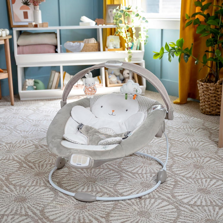 Inlighten Baby Bouncer Infant Seat with Light up -Toy Bar, Vibrations, Tummy Time Pillow & Sounds, 0-6 Months up to 20 Lbs (Twinkle Tails Bunny)