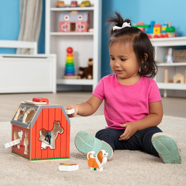 Wooden Take-Along Sorting Barn Toy with Flip-Up Roof and Handle, 10 Wooden Farm Play Pieces - Farm Toys, Shape Sorting and Stacking Learning Toys for Toddlers and Kids Ages 2+