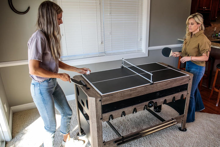 56” 4-In-1 Swivel Multi-Game Table - Air Hockey, Billiards, Foosball, Ping Pong - Rustic Wood Grain Finish, Brown