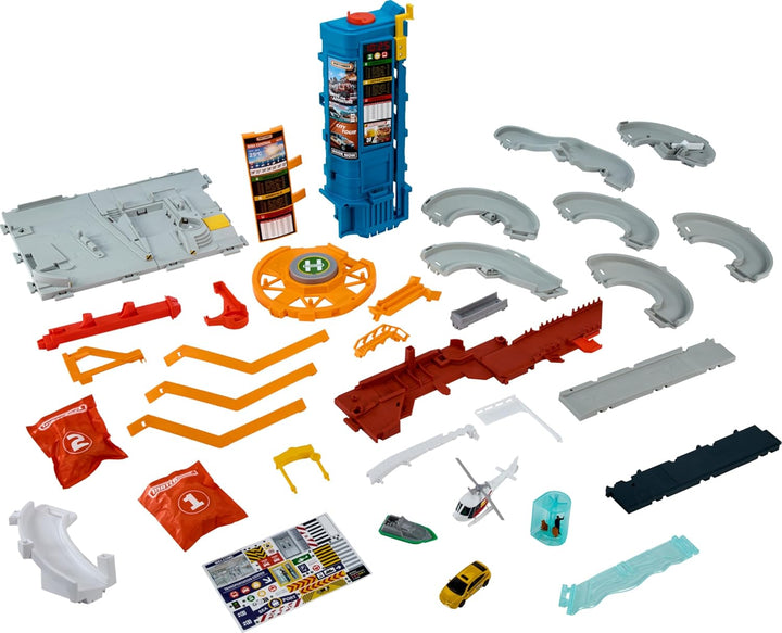 Toy Vehicles & Playset, Transportation Center with 5 Levels, Kid- & Car-Activated Features, 1:64 Scale Taxi, Boat & Helicopter & Food Vendor