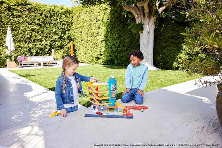 Toy Vehicles & Playset, Transportation Center with 5 Levels, Kid- & Car-Activated Features, 1:64 Scale Taxi, Boat & Helicopter & Food Vendor
